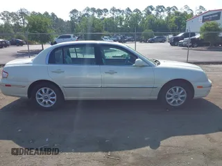 2004 Kia Amanti z VIN KNALD124145015796, wystawiony jako IAAI lot #42308909 z przebiegiem 111 156 mil mil oraz . Historia ofert i sprzedaży dostępna na DreamBid. Obrazek 13.