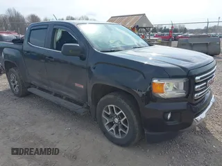 2015 GMC Canyon 4WD SLE z VIN 1GTG6BE32F1243209, wystawiony jako IAAI lot #42123541 z przebiegiem 133 620 mil mil oraz . Historia ofert i sprzedaży dostępna na DreamBid. Obrazek 1.