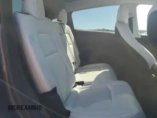 2022 Tesla Model Y Long Range z VIN 7SAYGAEE5NF573044, wystawiony jako Copart lot #49230835 z przebiegiem 41 220 mil mil oraz Szkody całkowita. Historia ofert i sprzedaży dostępna na DreamBid. Obrazek 12.