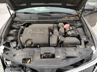 2015 Lincoln MKS with VIN 1LNHL9DK1FG600791, listed as a Copart auction lot 49575395 with 80,391 mi miles and Salvage Title. Bid and sale history available at carsss.com. Image 12.