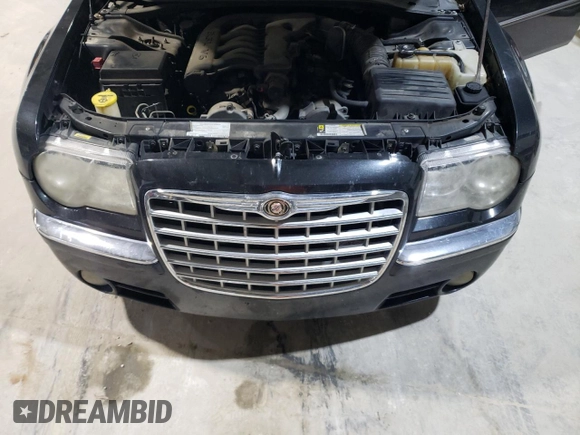 2008 Chrysler 300 z VIN 2C3LK33G58H203852, wystawiony jako Copart lot #86812404 z przebiegiem 213 031 mil mil oraz Szkoda całkowita • Salvage title. Historia ofert i sprzedaży dostępna na DreamBid. Obrazek 11.