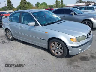 2002 BMW 3 Series 325i with VIN WBAET37492NG83135, listed as a IAAI auction lot 42028502 with 184,216 mi miles. Bid and sale history available at carsss.com. Image 1.