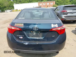 2018 Toyota Corolla L with VIN 2T1BURHE1JC052651, listed as a IAAI auction lot 42430958 with 104,664 mi miles and . Bid and sale history available at DreamBid. Image 16.