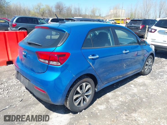 2023 Kia Rio S with VIN 3KPA25AD9PE514279, listed as a IAAI auction lot 42194256 with 76,630 mi miles and . Bid and sale history available at DreamBid. Image 4.