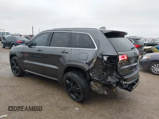 2016 Jeep Grand Cherokee High Altitude with VIN 1C4RJFCG7GC316309, listed as a IAAI auction lot 41557459 with 144,700 mi miles. Bid and sale history available at carsss.com. Image 3.