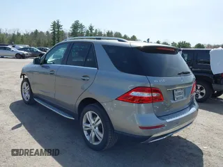 2014 Mercedes-Benz M 350 with VIN 4JGDA5HB4EA371774, listed as a IAAI auction lot 42079843 with 128,448 mi miles and . Bid and sale history available at DreamBid. Image 3.