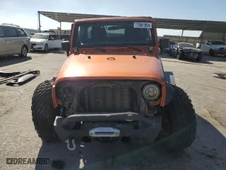 2011 Jeep Wrangler Unlimited Sahara with VIN 1J4BA5H19BL588797, listed as a Copart auction lot 72681904 with 100,763 mi miles and Salvage Title. Bid and sale history available at carsss.com. Image 5.