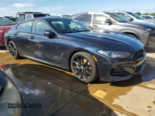 2024 BMW 8 Series 840i with VIN WBAGV2C03RCN18605, listed as a Copart auction lot 73822414 with 0 mi miles and Salvage Title. Bid and sale history available at carsss.com. Image 4.