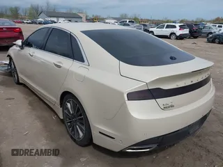 2014 Lincoln MKZ z VIN 3LN6L2JK7ER821385, wystawiony jako IAAI lot #42114154 z przebiegiem 141 480 mil mil oraz . Historia ofert i sprzedaży dostępna na DreamBid. Obrazek 3.