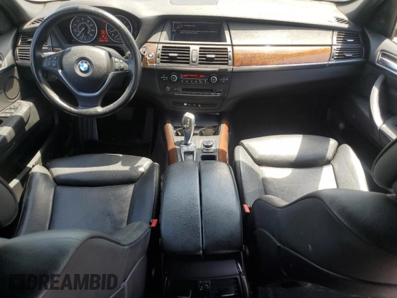2012 BMW X5 35i z VIN 5UXZV4C51CL744313, wystawiony jako Copart lot #58270755 z przebiegiem 97 903 mil mil oraz Szkoda całkowita • Salvage title. Historia ofert i sprzedaży dostępna na DreamBid. Obrazek 8.