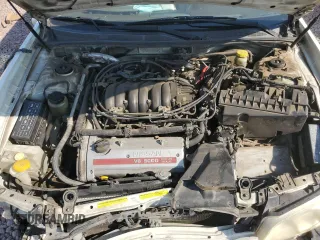 2001 Nissan Maxima GXE z VIN JN1CA31D71T827204, wystawiony jako Copart lot #71219104 z przebiegiem 195 343 mil mil oraz Szkoda całkowita • Salvage title. Historia ofert i sprzedaży dostępna na DreamBid. Obrazek 11.
