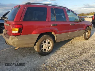 2002 Jeep Grand Cherokee with VIN 1J8GX38S82C176323, listed as a Copart auction lot 78520444 with 206,258 mi miles and Salvage title. Bid and sale history available at DreamBid. Image 3.