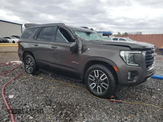 2021 GMC Yukon AT4 with VIN 1GKS2CKD8MR299277, listed as a Copart auction lot 47027565 with 54,806 mi miles and Salvage Title. Bid and sale history available at carsss.com. Image 4.