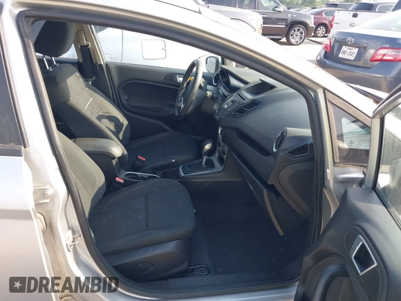 2014 Ford Fiesta SE with VIN 3FADP4EJ3EM217736, listed as a IAAI auction lot 42139037 with 138,378 mi miles and . Bid and sale history available at DreamBid. Image 5.
