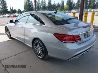 2016 Mercedes-Benz E 400 with VIN WDDKJ6HB6GF328700, listed as a IAAI auction lot 42157340 with 125,183 mi miles and . Bid and sale history available at DreamBid. Image 3.