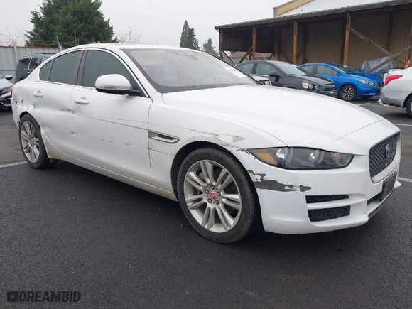 2019 Jaguar XE 25t with VIN SAJAR4FX0KCP52659, listed as a IAAI auction lot 41332080 with 96,936 mi miles. Bid and sale history available at carsss.com. Image 1.