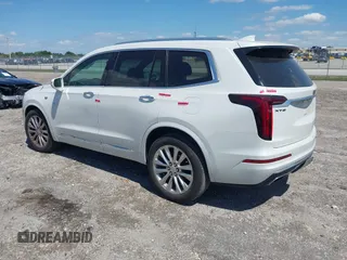 2020 Cadillac XT6 FWD Premium Luxury z VIN 1GYKPCRS1LZ228982, wystawiony jako IAAI lot #41975364 z przebiegiem 84 803 mil mil oraz . Historia ofert i sprzedaży dostępna na DreamBid. Obrazek 3.