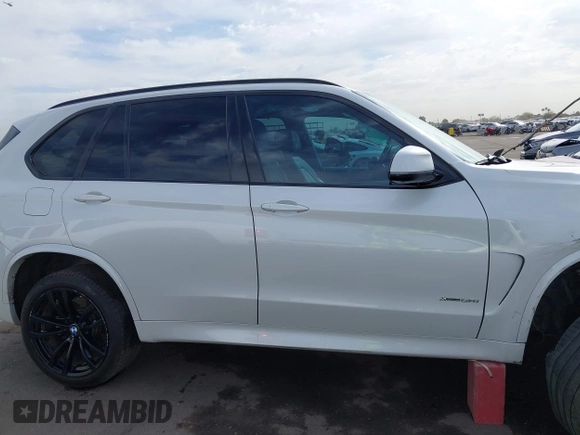 2017 BMW X5 xDrive50i с VIN 5UXKR6C3XH0J85028, выставлен на аукционе IAAI как лот 41889220 с пробегом 107 105 миль миль и . История ставок и продаж доступна на DreamBid. Изображение 13.