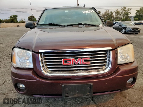 2007 GMC Envoy SLT with VIN 1GKDT13S072276581, listed as a Copart auction lot 71139974 with 271,760 mi miles and Salvage Title. Bid and sale history available at carsss.com. Image 5.