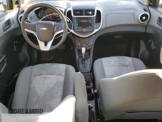 2018 Chevrolet Sonic LS with VIN 1G1JB5SH8J4121988, listed as a Copart auction lot 88000095 with 64,875 mi miles and Salvage title. Bid and sale history available at DreamBid. Image 8.