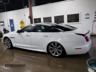 2015 Jaguar XJ with VIN SAJWJ1CD3F8V89374, listed as a Copart auction lot 49416114 with 94,636 mi miles and . Bid and sale history available at DreamBid. Image 2.