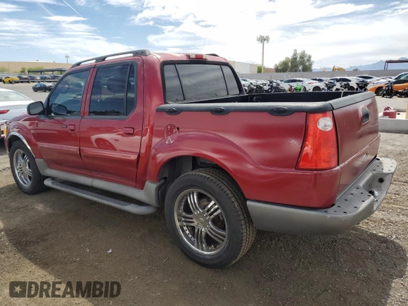 2003 Ford Explorer Sport Trac XLS z VIN 1FMZU67EX3UA71831, wystawiony jako Copart lot #57167025 z przebiegiem 145 290 mil mil oraz Szkoda całkowita • Salvage title. Historia ofert i sprzedaży dostępna na DreamBid. Obrazek 2.