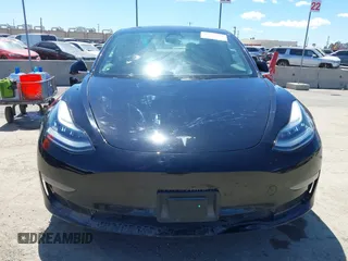 2019 Tesla Model 3 Mid Range with VIN 5YJ3E1EA3KF325056, listed as a IAAI auction lot 41771543 with 183,157 mi miles and . Bid and sale history available at carsss.com. Image 12.