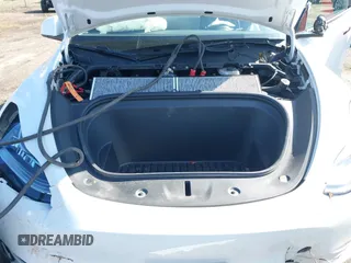 2021 Tesla Model Y Long Range with VIN 5YJYGDEE9MF239726, listed as a IAAI auction lot 41952158 with 37,088 mi miles and . Bid and sale history available at DreamBid. Image 10.