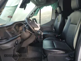 2020 Ford Transit Cargo with VIN 1FTBF4XG3LKB70573, listed as a Copart auction lot 77039474 with 131,873 mi miles and Salvage Title. Bid and sale history available at DreamBid. Image 7.