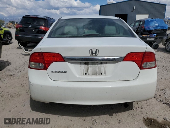 2010 Honda Civic LX with VIN 19XFA1F53AE061741, listed as a Copart auction lot 54627295 with 237,104 mi miles and Salvage Title. Bid and sale history available at DreamBid. Image 6.