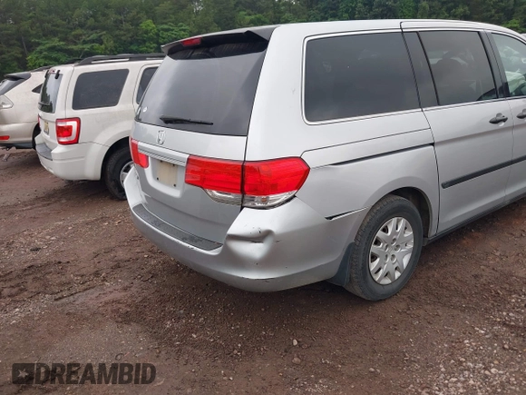 2010 Honda Odyssey LX with VIN 5FNRL3H21AB100181, listed as a IAAI auction lot 42258010 with 246,463 mi miles and . Bid and sale history available at DreamBid. Image 14.