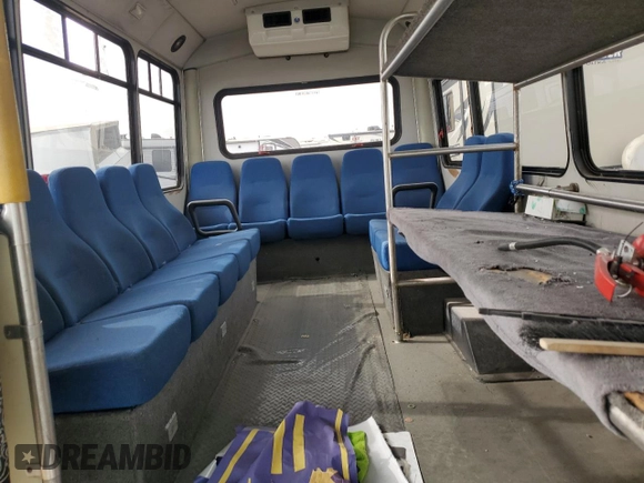2013 Ford Econoline Commercial z VIN 1FDEE3FL0DDB09661, wystawiony jako Copart lot #74102754 z przebiegiem 357 776 mil mil oraz Tytuł czysty. Historia ofert i sprzedaży dostępna na DreamBid. Obrazek 10.