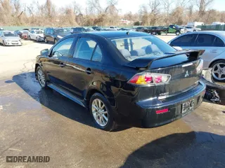 2016 Mitsubishi Lancer ES with VIN JA32U2FUXGU003461, listed as a IAAI auction lot 41804879 with 147,036 mi miles. Bid and sale history available at carsss.com. Image 3.