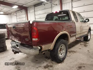 1999 Ford F-150 z VIN 2FTRX18W9XCA83920, wystawiony jako IAAI lot #41875700 z przebiegiem 234 325 mil mil oraz . Historia ofert i sprzedaży dostępna na DreamBid. Obrazek 4.