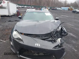 2014 Scion FR-S with VIN JF1ZNAA1XE9706469, listed as a IAAI auction lot 41942773 with 74,641 mi miles and . Bid and sale history available at DreamBid. Image 12.