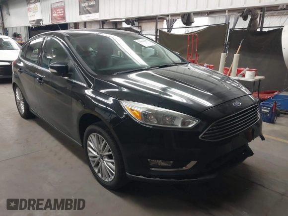 2017 Ford Focus Titanium with VIN 1FADP3N24HL272396, listed as a IAAI auction lot 41852208 with 92,945 mi miles and . Bid and sale history available at carsss.com. Image 1.