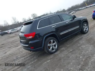 2013 Jeep Grand Cherokee Overland with VIN 1C4RJECG5DC621149, listed as a IAAI auction lot 41255140 with 157,355 mi miles. Bid and sale history available at carsss.com. Image 4.