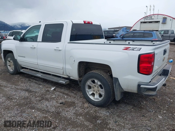 2018 Chevrolet Silverado 1500 LT with VIN 3GCUKREC0JG594914, listed as a IAAI auction lot 41735134 with 98,407 mi miles. Bid and sale history available at carsss.com. Image 3.