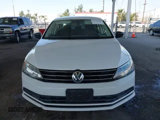 2015 Volkswagen Jetta Sedan 2.0L S with VIN 3VW2K7AJ3FM253125, listed as a IAAI auction lot 41535632 with 103,953 mi miles. Bid and sale history available at carsss.com. Image 12.
