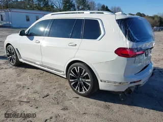 2020 BMW X7 xDrive40i with VIN 5UXCW2C05L9C18696, listed as a IAAI auction lot 41598890 with 102,599 mi miles. Bid and sale history available at carsss.com. Image 3.