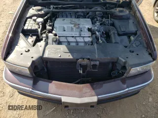 1995 Cadillac Concours z VIN 1G6KF52Y1SU245573, wystawiony jako Copart lot #68715984 z przebiegiem Nie podano mil oraz Szkody całkowita. Historia ofert i sprzedaży dostępna na DreamBid. Obrazek 11.