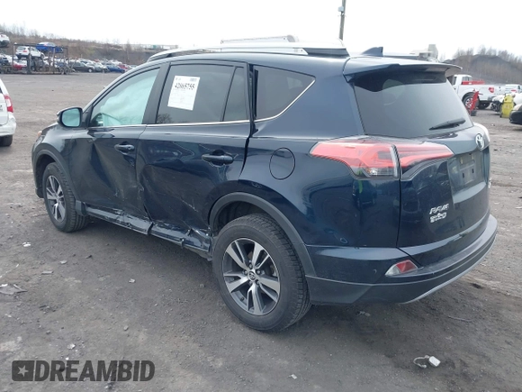 2018 Toyota RAV4 XLE with VIN 2T3RFREV9JW746782, listed as a IAAI auction lot 42065755 with 61,219 mi miles. Bid and sale history available at carsss.com. Image 3.
