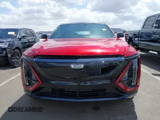 2024 Cadillac LYRIQ Sport z VIN 1GYKPWRL1RZ129064, wystawiony jako IAAI lot #41919587 z przebiegiem 2148 mil mil oraz . Historia ofert i sprzedaży dostępna na DreamBid. Obrazek 12.