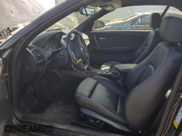 2009 BMW 1 Series 128i with VIN WBAUN13529VH81121, listed as a Copart auction lot 77849094 with 30,756 mi miles and Salvage Title. Bid and sale history available at DreamBid. Image 7.