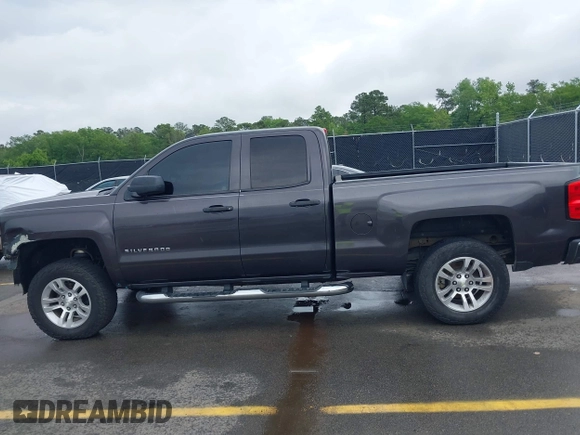2014 Chevrolet Silverado 1500 LT with VIN 1GCRCREC5EZ161985, listed as a IAAI auction lot 42096479 with 225,412 mi miles and . Bid and sale history available at DreamBid. Image 15.
