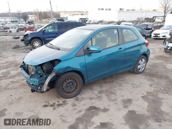 2013 Toyota Yaris L with VIN JTDJTUD38DD553999, listed as a IAAI auction lot 41642903 with 75,795 mi miles. Bid and sale history available at carsss.com. Image 2.