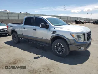 2017 Nissan Titan XD PRO-4X with VIN 1N6BA1F45HN525928, listed as a Copart auction lot 55773415 with 100,295 mi miles and Clean Title. Bid and sale history available at carsss.com. Image 4.