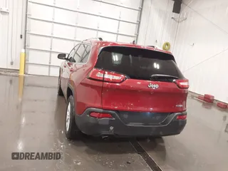 2015 Jeep Cherokee Latitude with VIN 1C4PJLCB6FW616477, listed as a IAAI auction lot 41812431 with 131,234 mi miles. Bid and sale history available at carsss.com. Image 17.