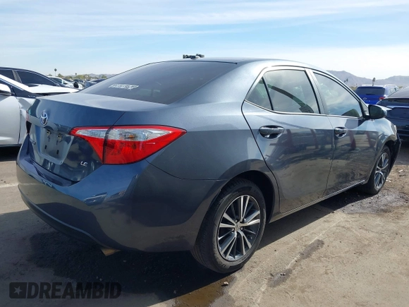 2016 Toyota Corolla L with VIN 5YFBURHE8GP561600, listed as a IAAI auction lot 41389830 with 129,897 mi miles and . Bid and sale history available at DreamBid. Image 4.