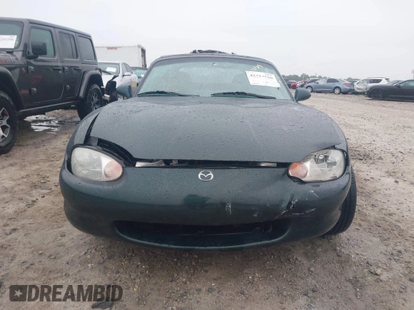 1999 Mazda MX-5 Miata with VIN JM1NB3539X0123231, listed as a IAAI auction lot 42314156 with 154,755 mi miles and . Bid and sale history available at DreamBid. Image 12.